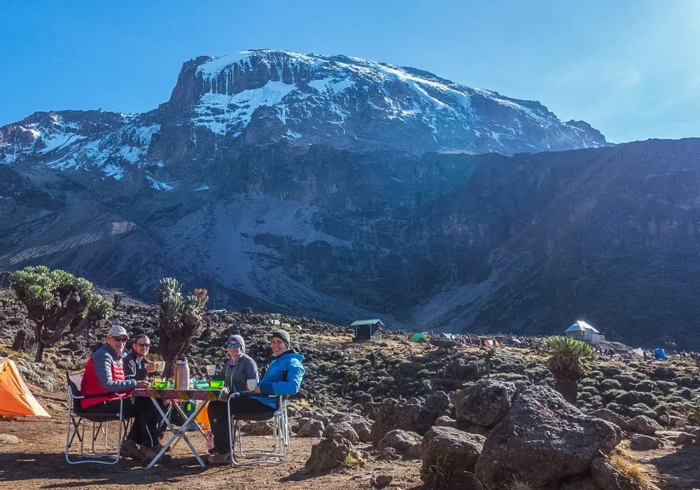 Hikers having breakfast at Barranco Camp on Mount Kilimanjaro