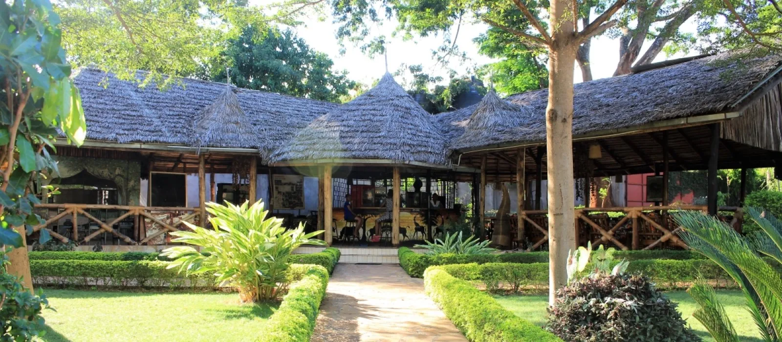 Relaxing bar and garden area at Chanya Lodge in Moshi