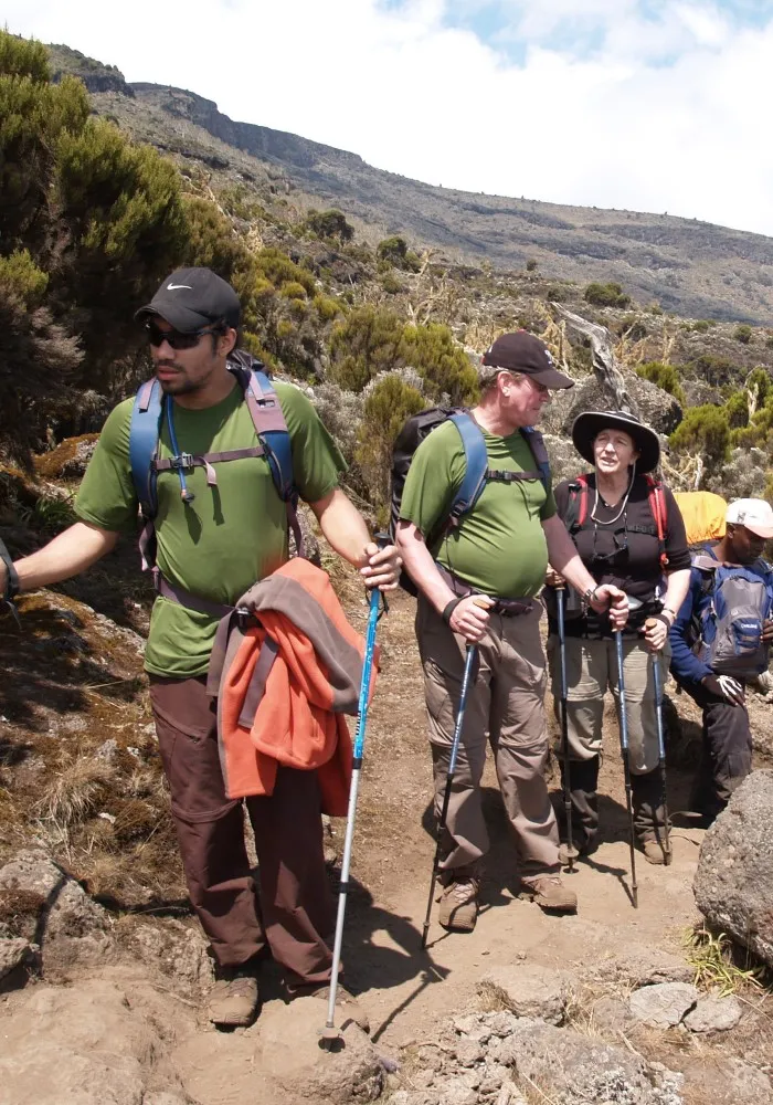 Hikers heading uphill along the Shira Ridge on Mount Kilimanjaro