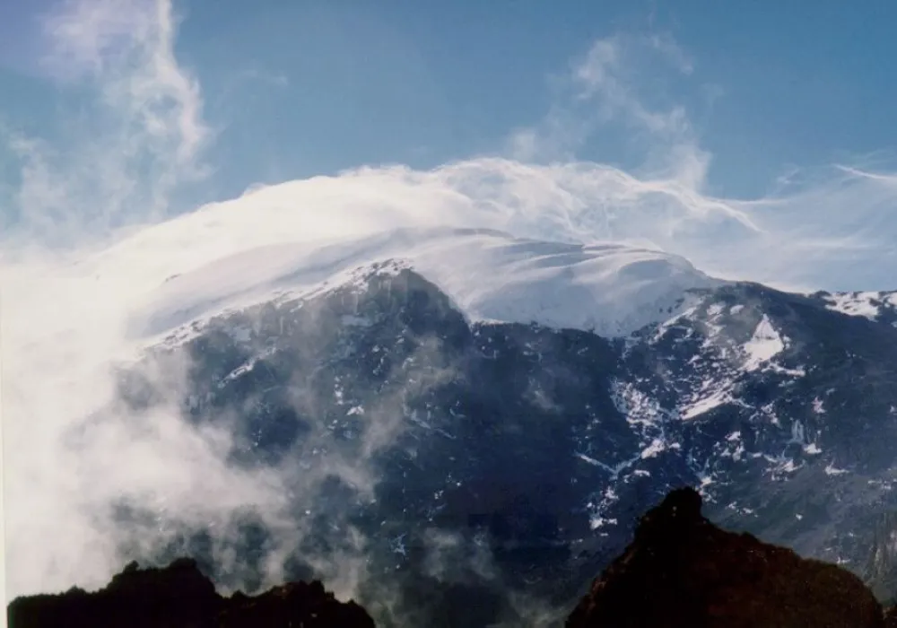 Changing cloud and weather conditions around the upper slopes of Mount Kilimanjaro