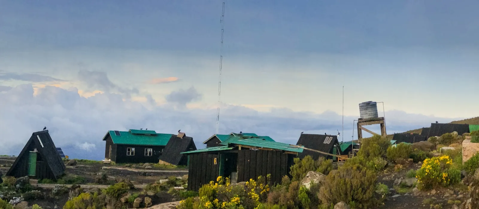 Mountain huts and communication antenna on Mount Kilimanjaro